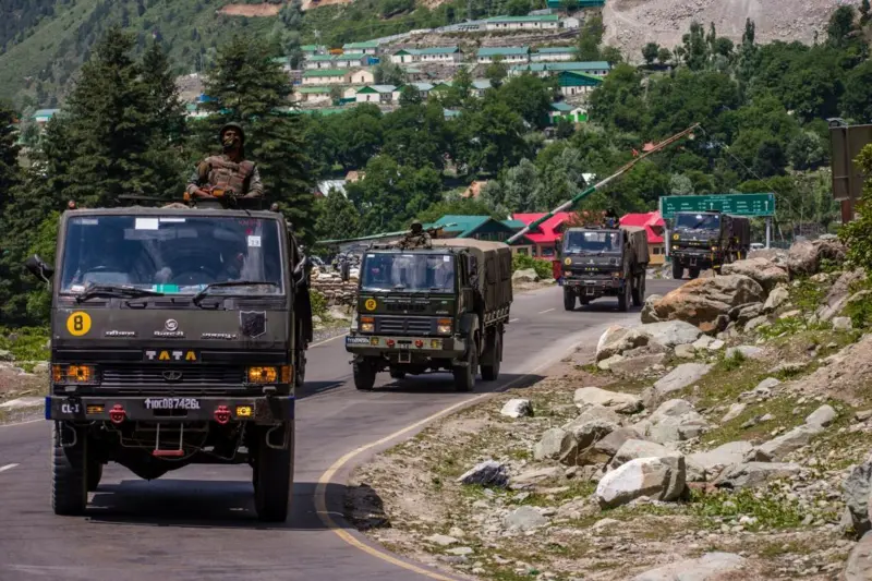 An Indian army convoy heads towards Leh on a highway bordering China | Getty Images